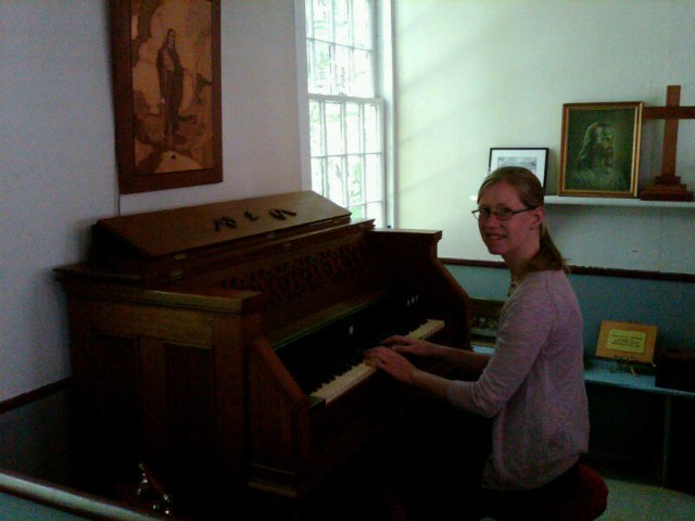 Ann at pump organ